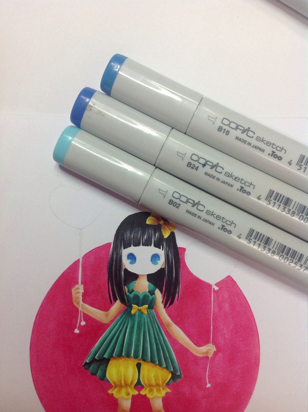 Begin colouring the eyes with you favourite colour.