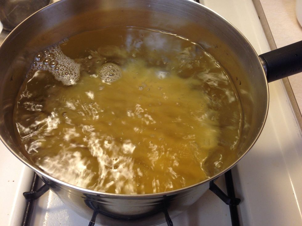 Begin cooking your fettuccine. Follow the directions given on package for best results.