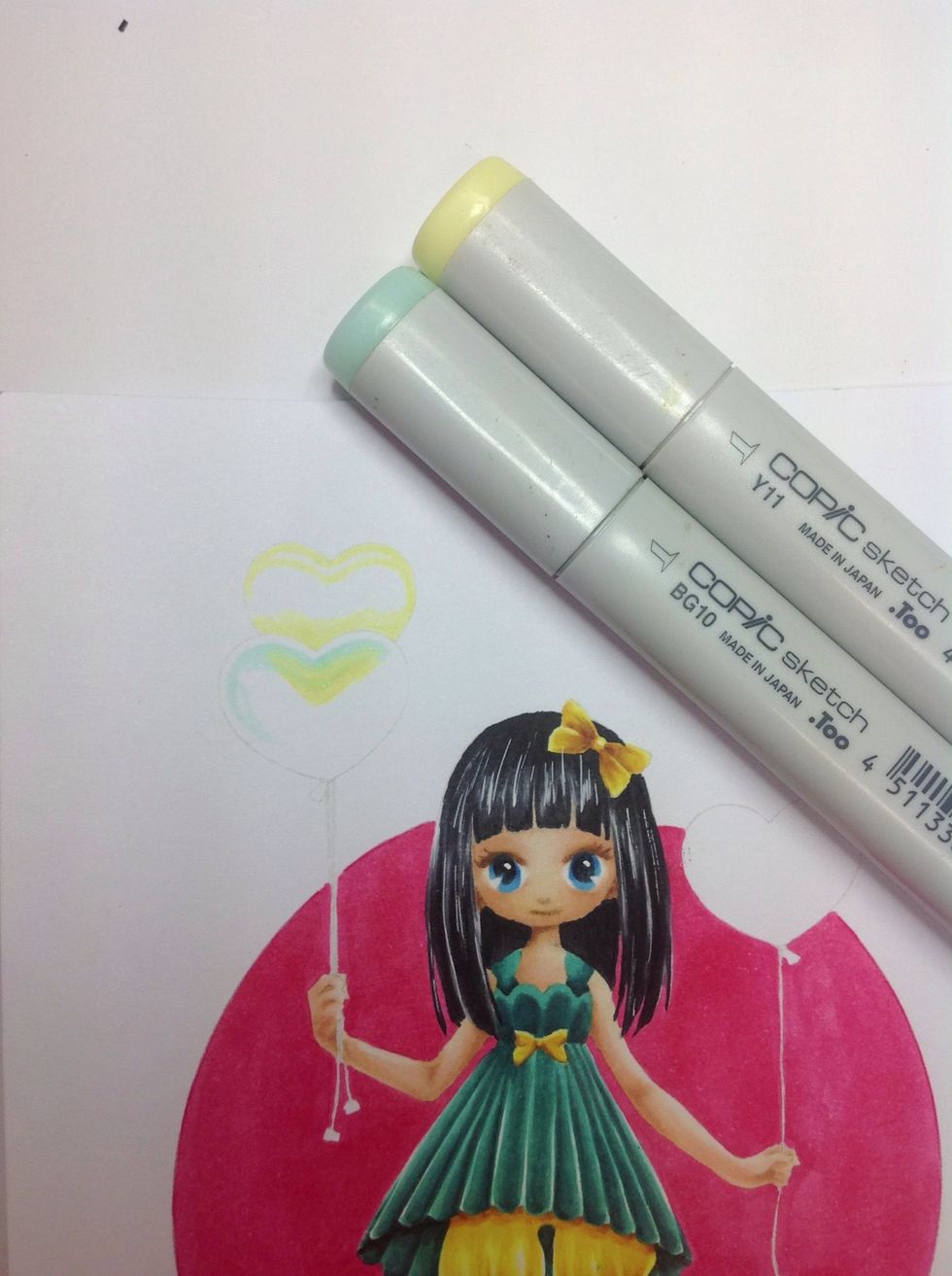 Begin forming shape of balloons using lightest shades.