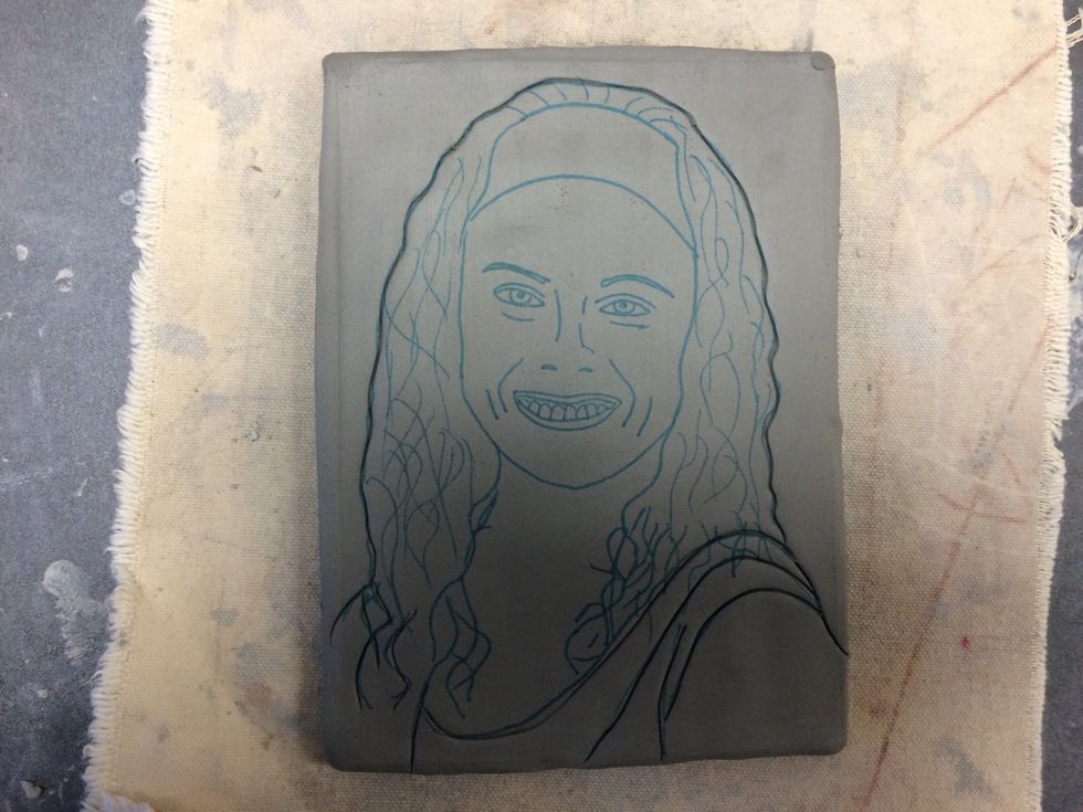 Begin going over your lines LIGHTLY with the needle tool.