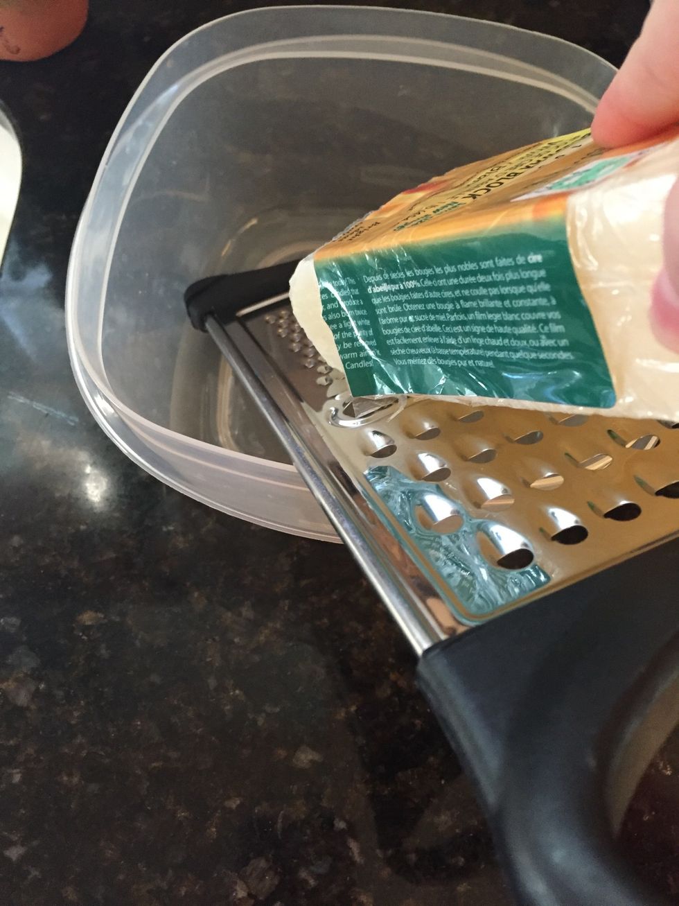 Begin grating beeswax