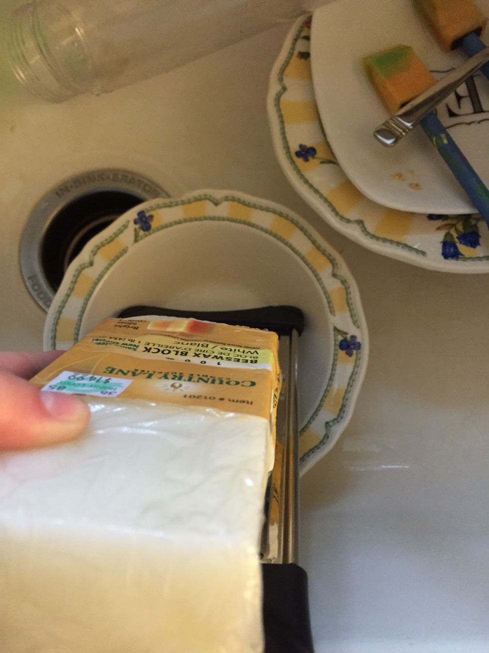 Begin grating beeswax