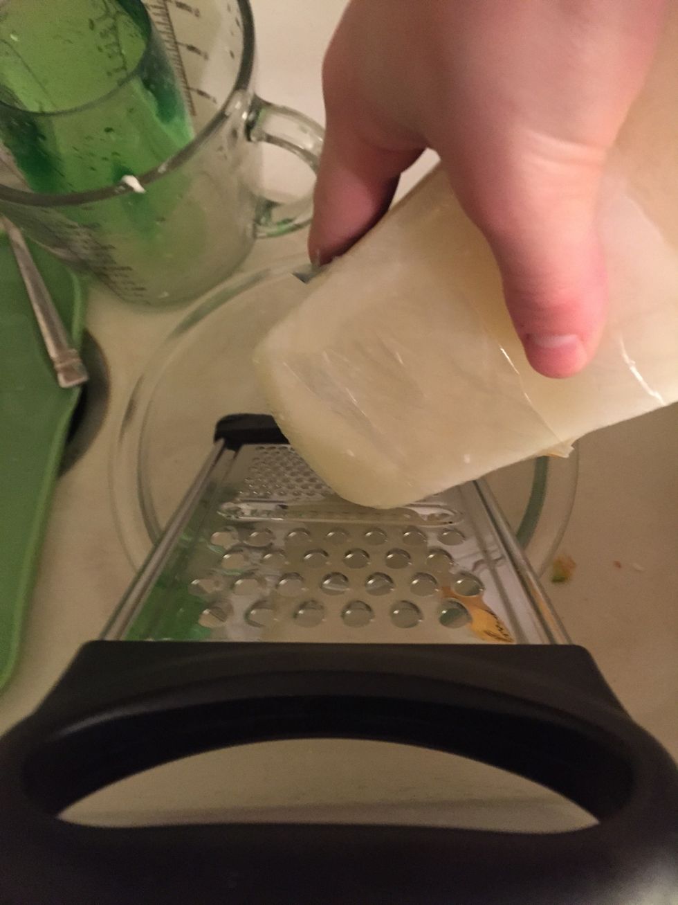 Begin grating beeswax