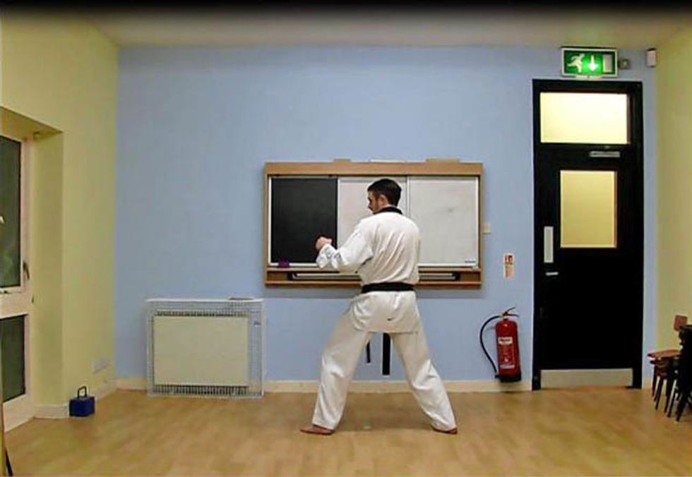 Begin in a side on stance, feet two shoulder widths apart, with the kicking leg back. Feet should be parallel, pointing slightly to the side. Keep the guard up throughout.