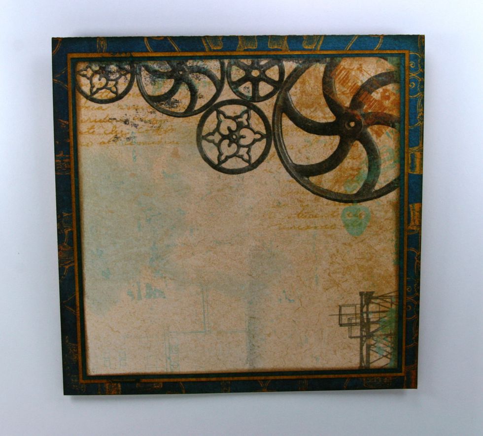 Begin layering the center with the next layer cut to 4 3/4 x 4 3/4 inches. Ink well and attach to base.