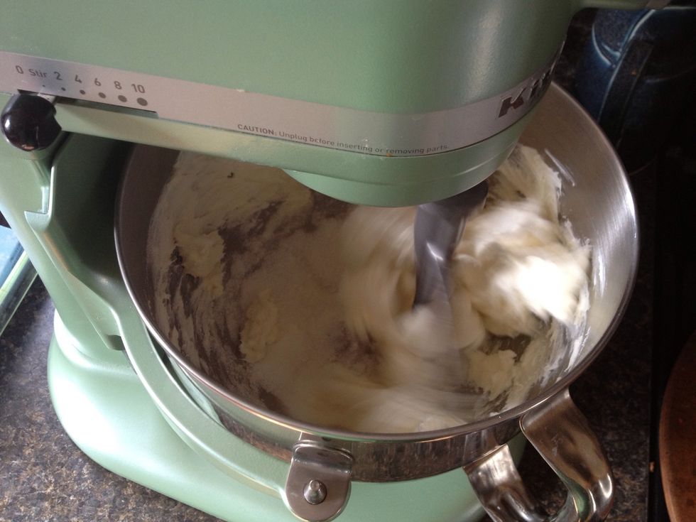 Begin mixing on medium speed. You'll want these two to be nice and creamy. No lumps. Remember to scrape the sides and bottom at least once.