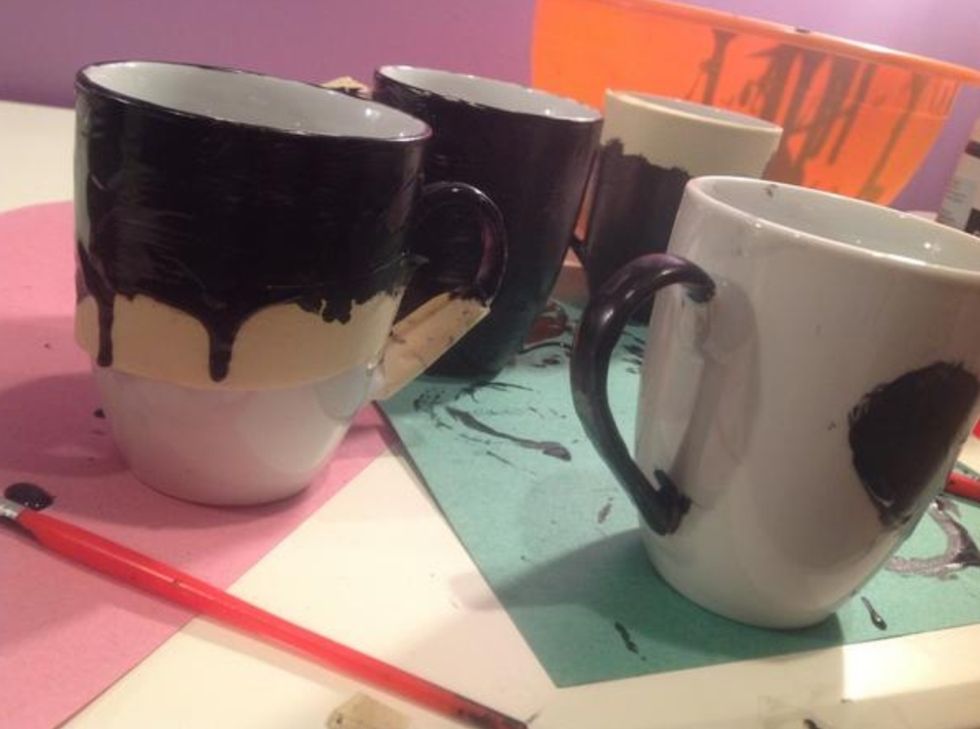 Begin painting, and try to go in one direction instead of painting all over the place, the masking tape is so that you don't get paint on the part you don't want painted