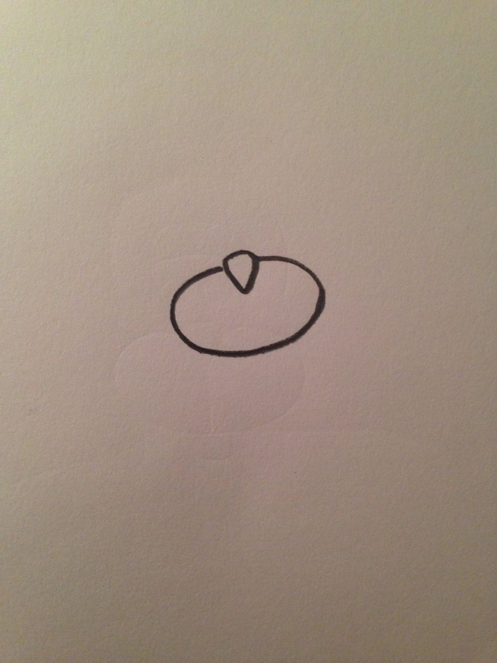 Begin really simple. Draw a rounded triangle nose and some oval cheeks.
