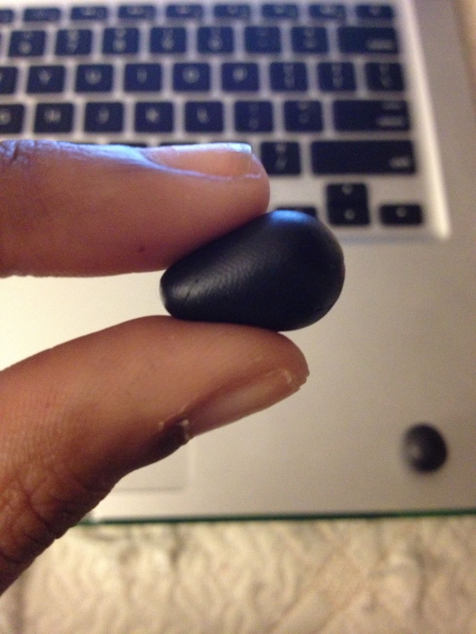 Begin rolling and shaping the balls gently into a cone shape.