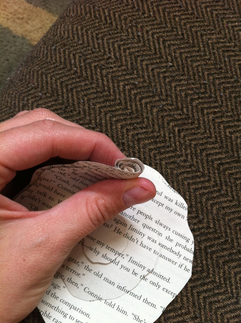 Begin rolling it in a tight roll. This will be the center of the rose.