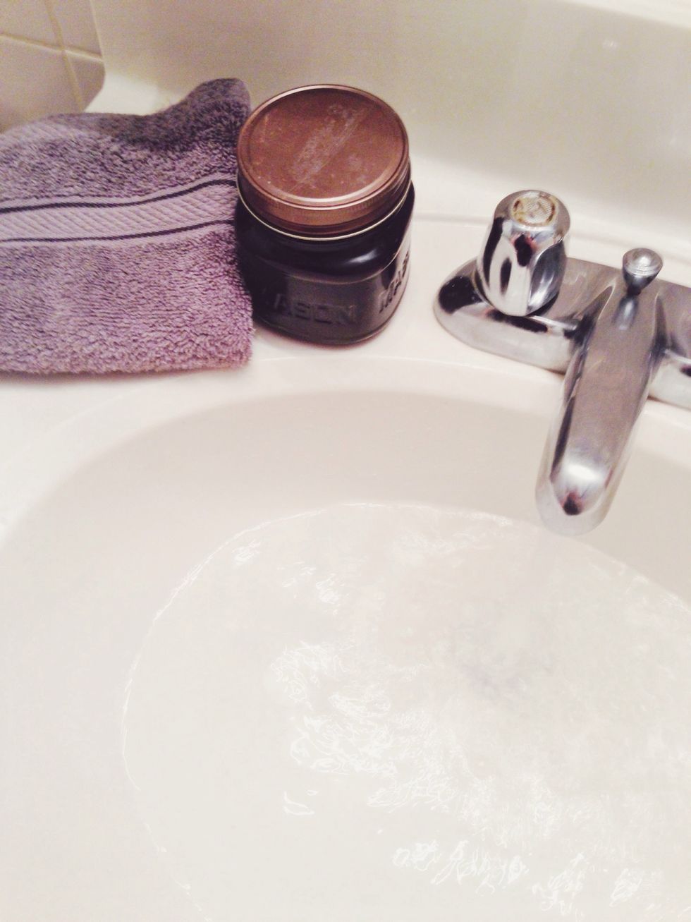 Begin running hot water.