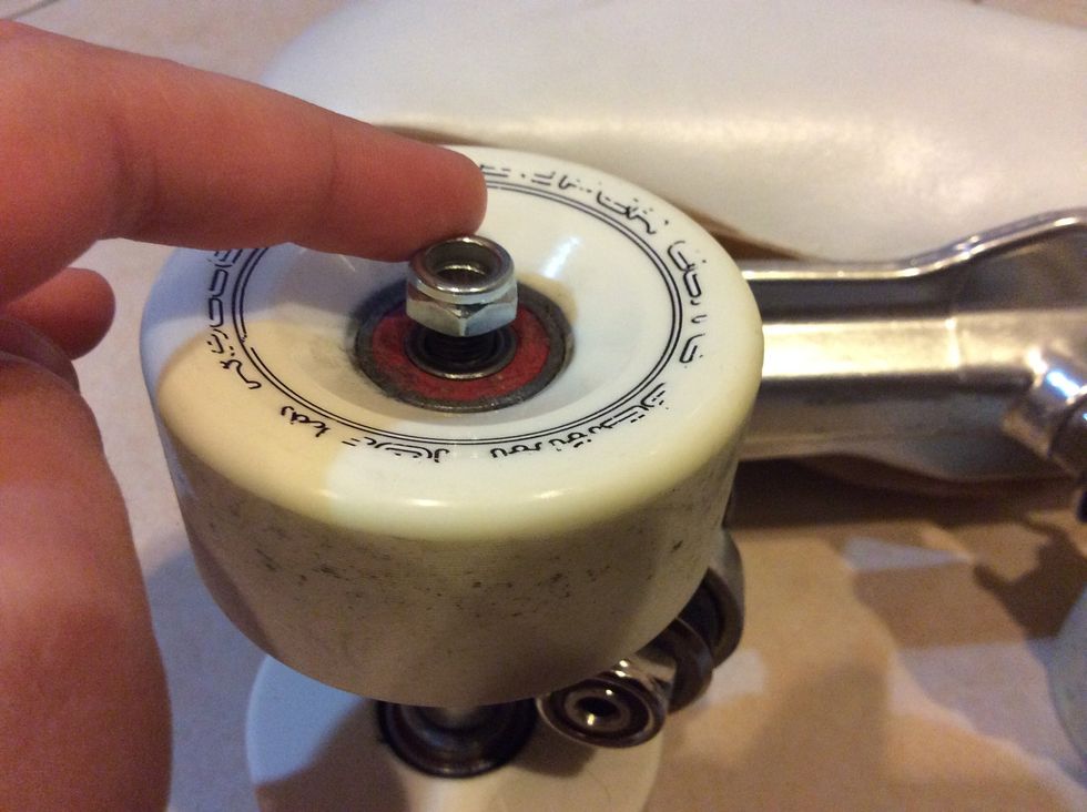 Begin screwing it on with your finger until it is too hard to screw any longer, don't make it go tighter if you can feel it tightening.