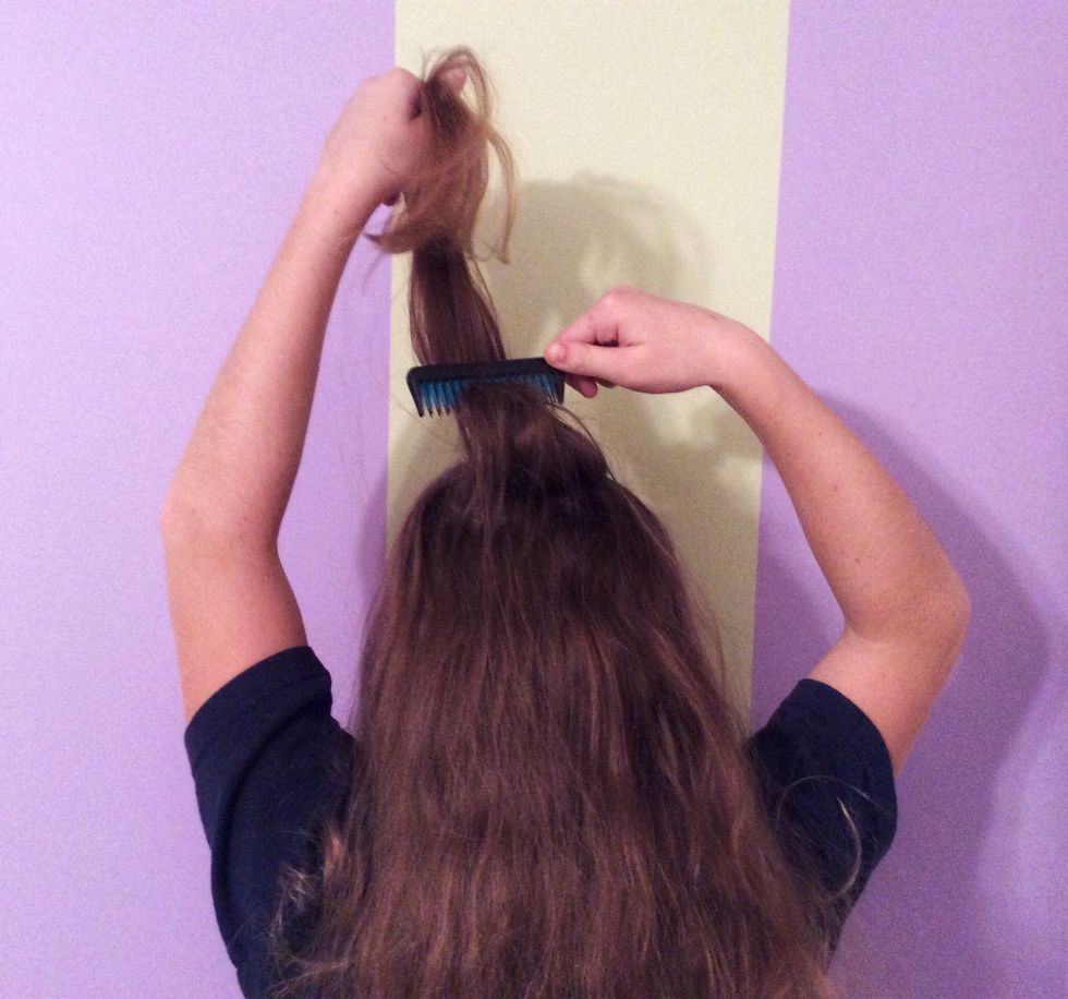 Begin teasing your hair while it is down. It is best if you use dirty hair instead of clean hair.