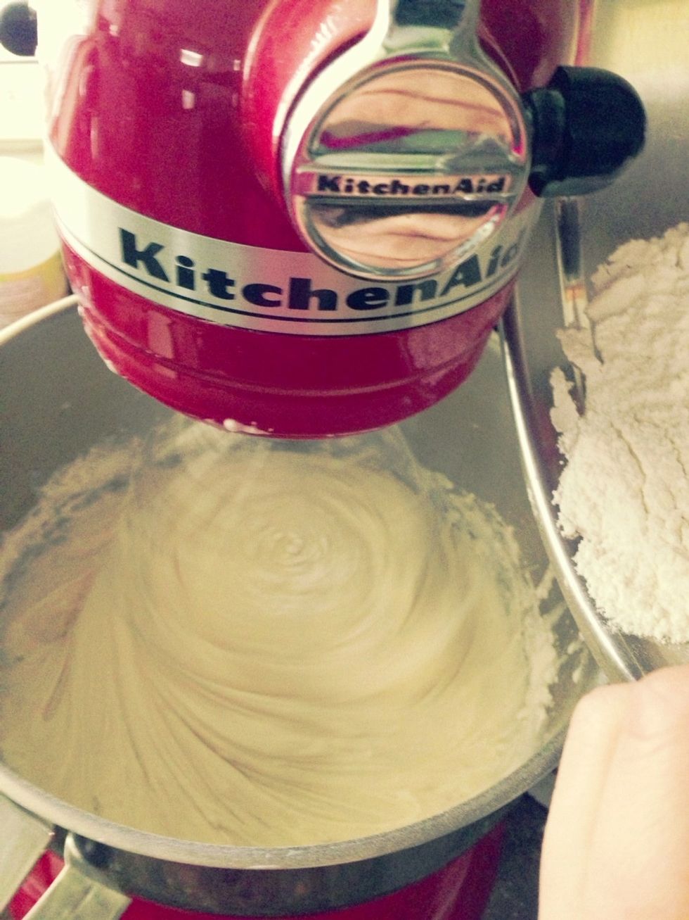 Begin to add flour mixture and buttermilk alternately to sugar mixture, beginning and ending with flour mixture.