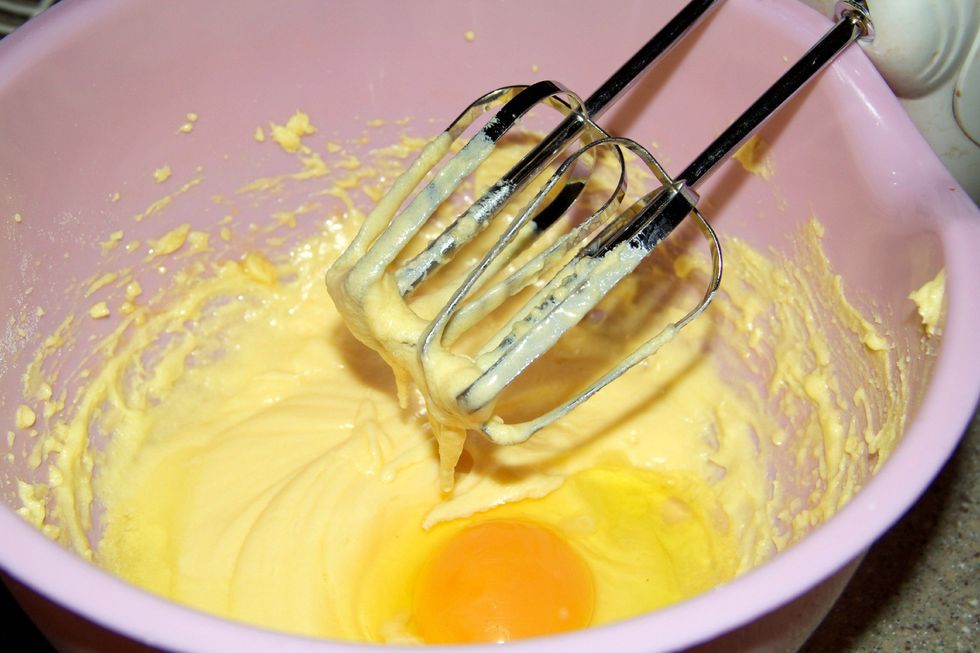 begin to add one egg then mix, then the next and add your vanilla in too! Mix until you start to see air bubbles incorporate in to the mix