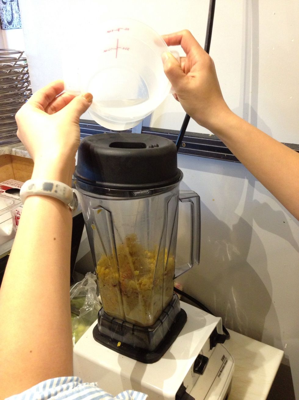 Begin to blend! Add small amounts of hot water to help the corn blend.