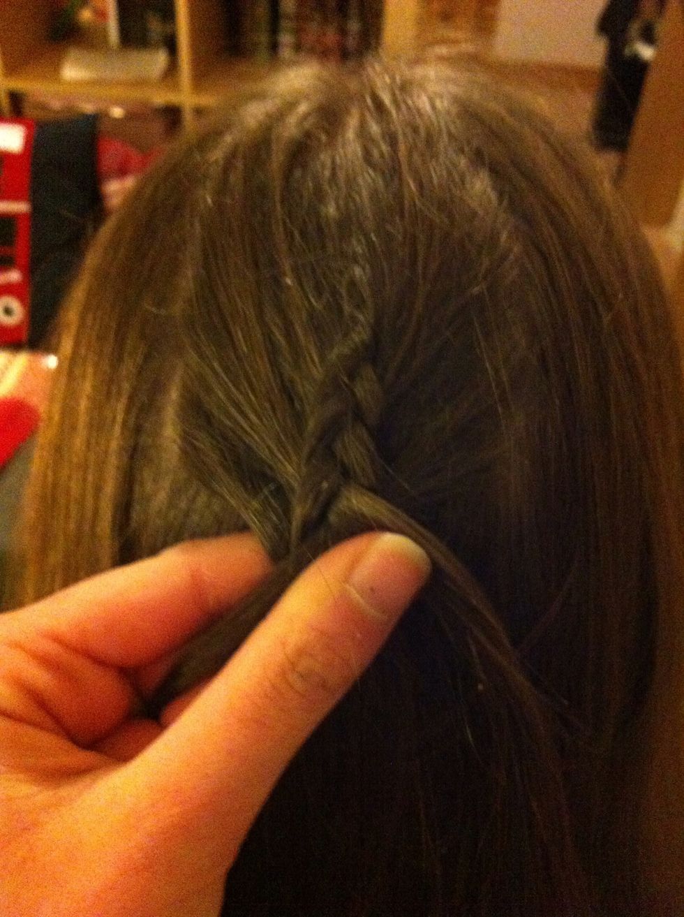 Begin to Dutch braid down your head.