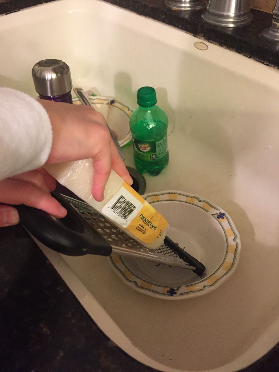 Begin to grate beeswax