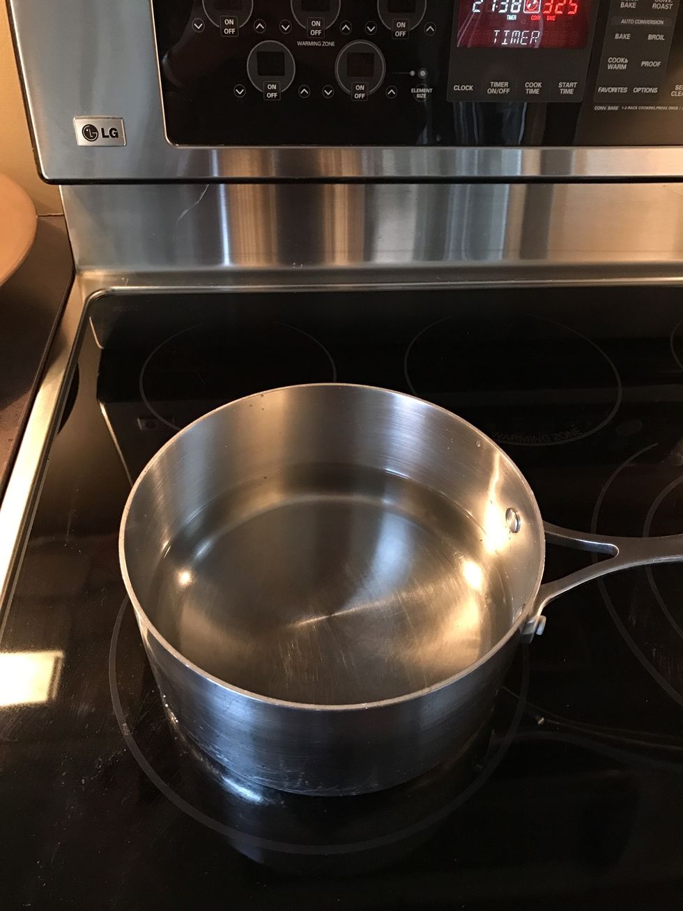 Begin to heat up the water for quinoa