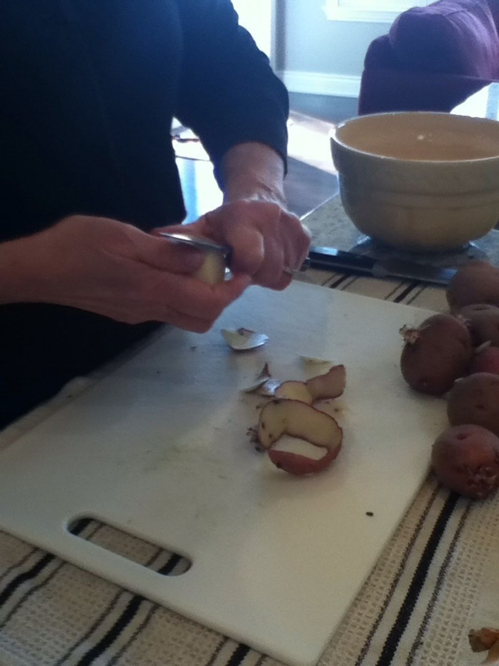 Begin to peel your potatoes once done set aside.