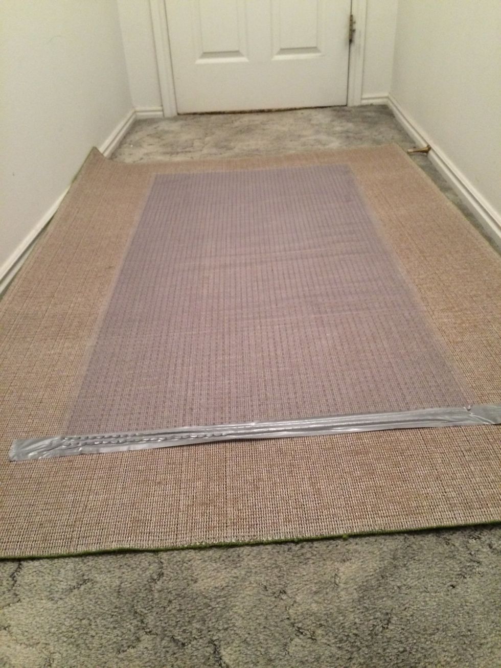 How to secure an area rug over carpet B+C Guides