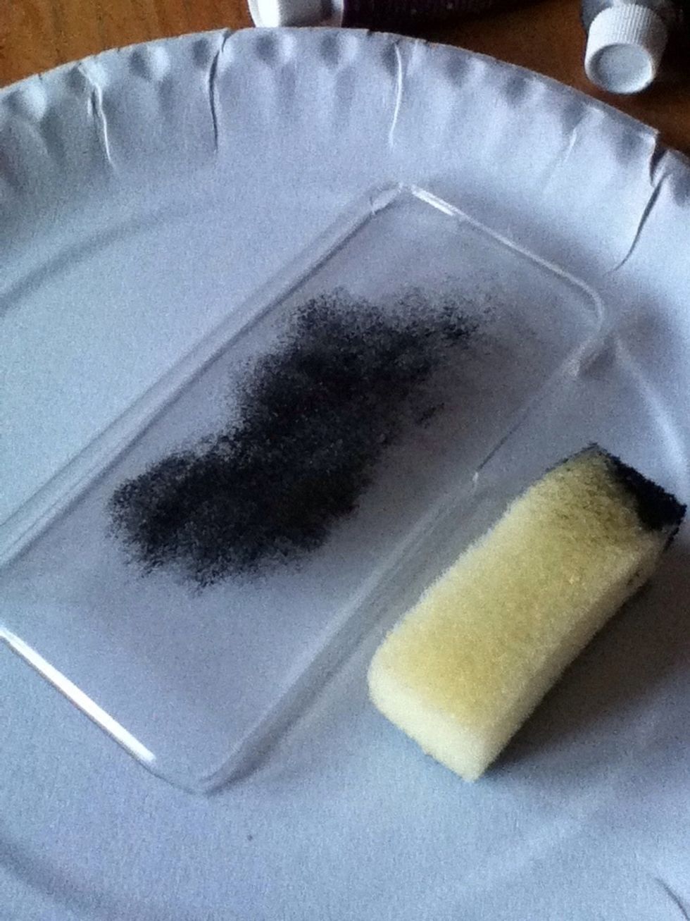 Begin to sponge on a black base coat.