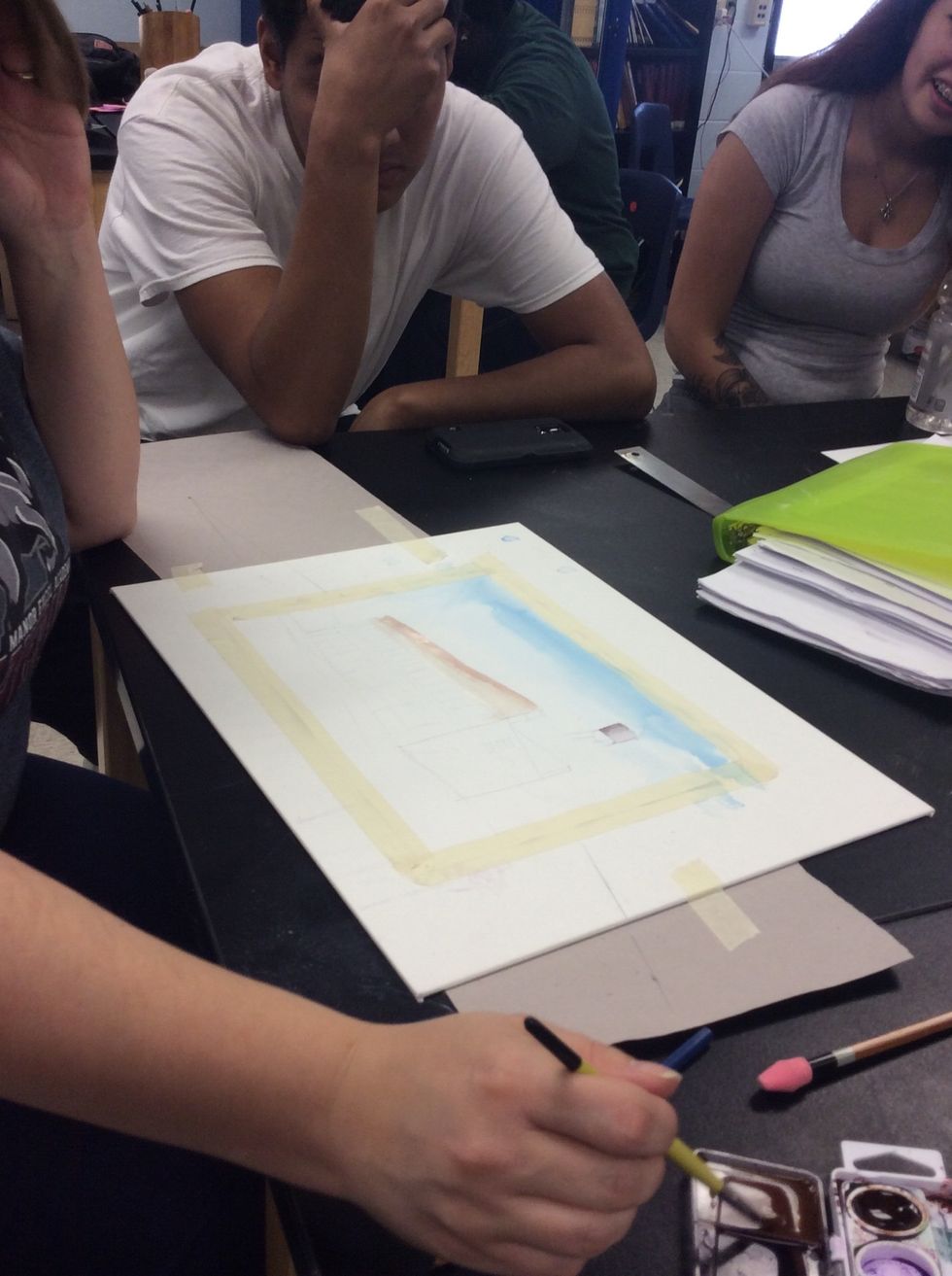 Begin with a light flat wash on items in the background