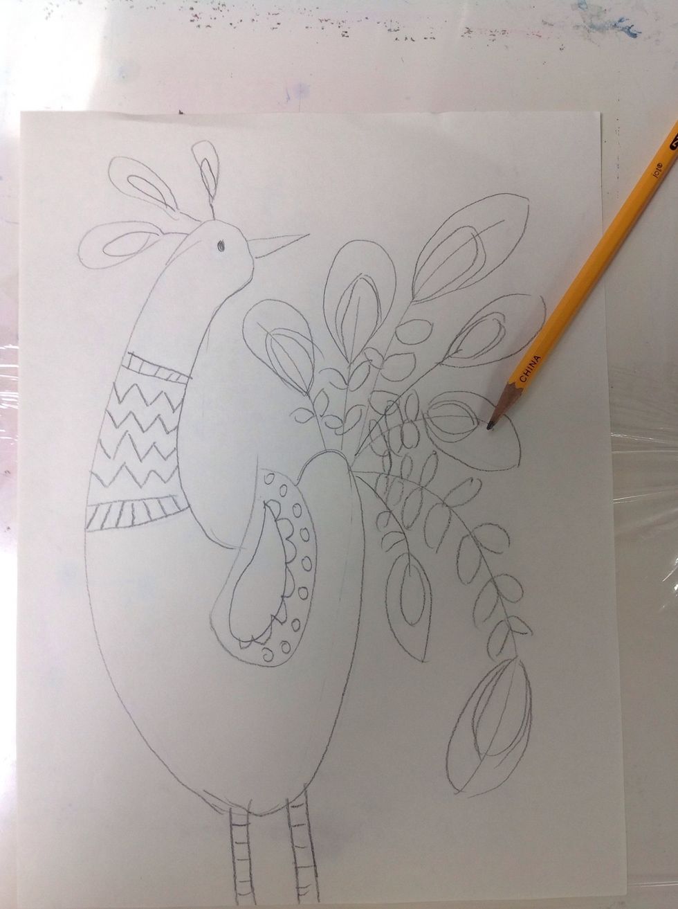 Begin with a pencil drawing. I laid mine over a piece of carbon paper so the image will be on both sides. You can make your own carbon paper by scribbling graphite on a separate piece of paper.