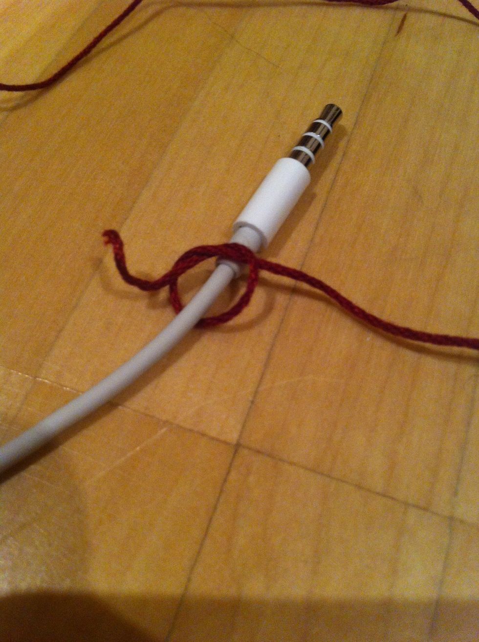 Begin with a simple overhand knot