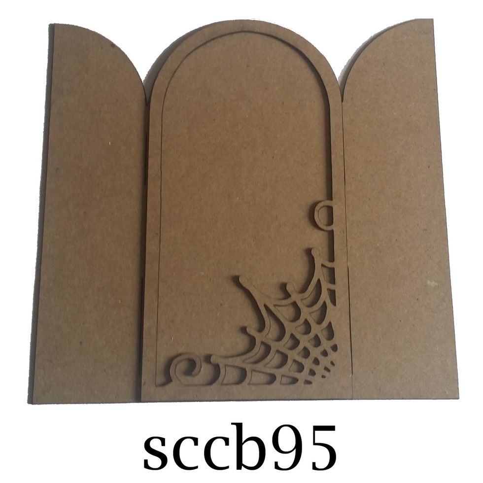 Begin with Shrine Chipboard Frame 2 from Sin City Stamps.