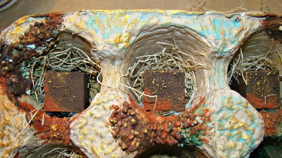 Behind the blocks I wanted to fill in the negative space so I glued down some plant filler.