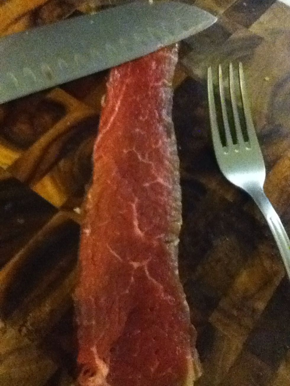 Behold a nice piece of meat. If I told you how little I paid for this and a dozen other pieces just like it, you'd call me a liar. It was two bucks a pound. I know how to shop for groceries. Slice it.