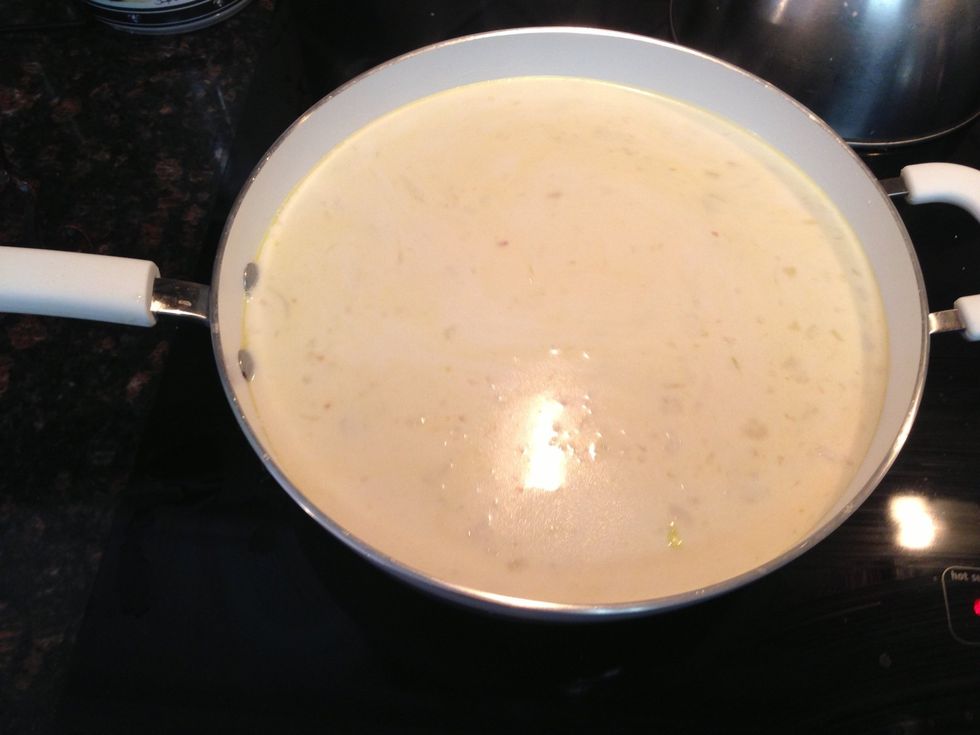Being back up to a simmer & continue to whisk. See how cream white it is now.