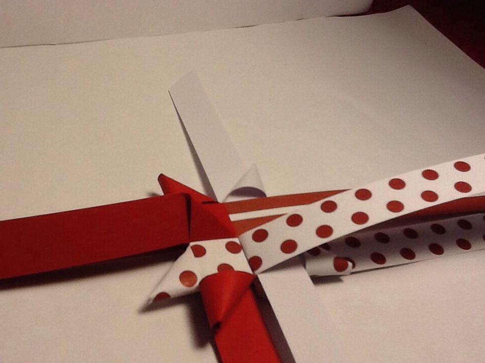 Bend back the red to make another triangle