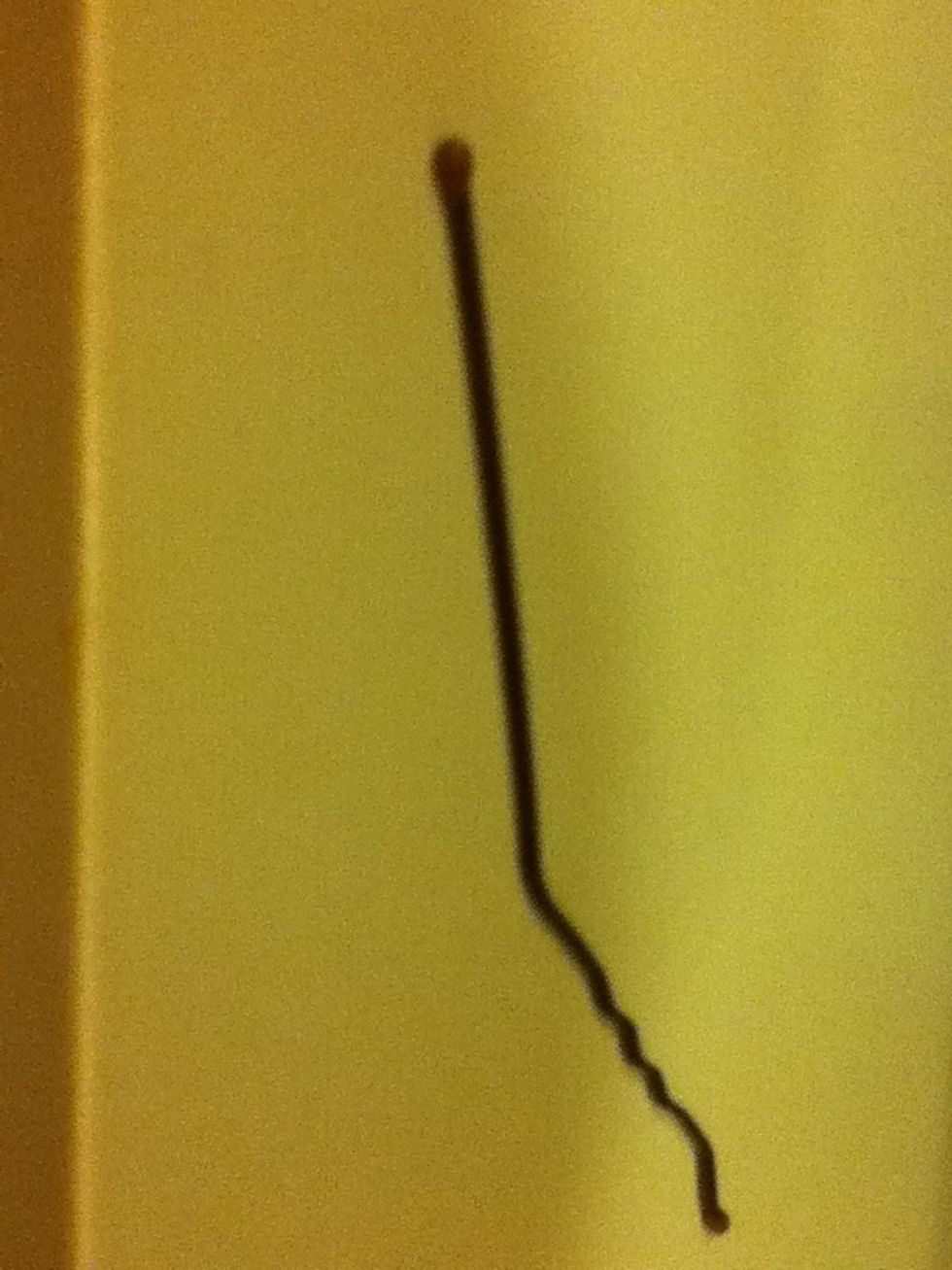 Bend bobby pin and get as straight as you can