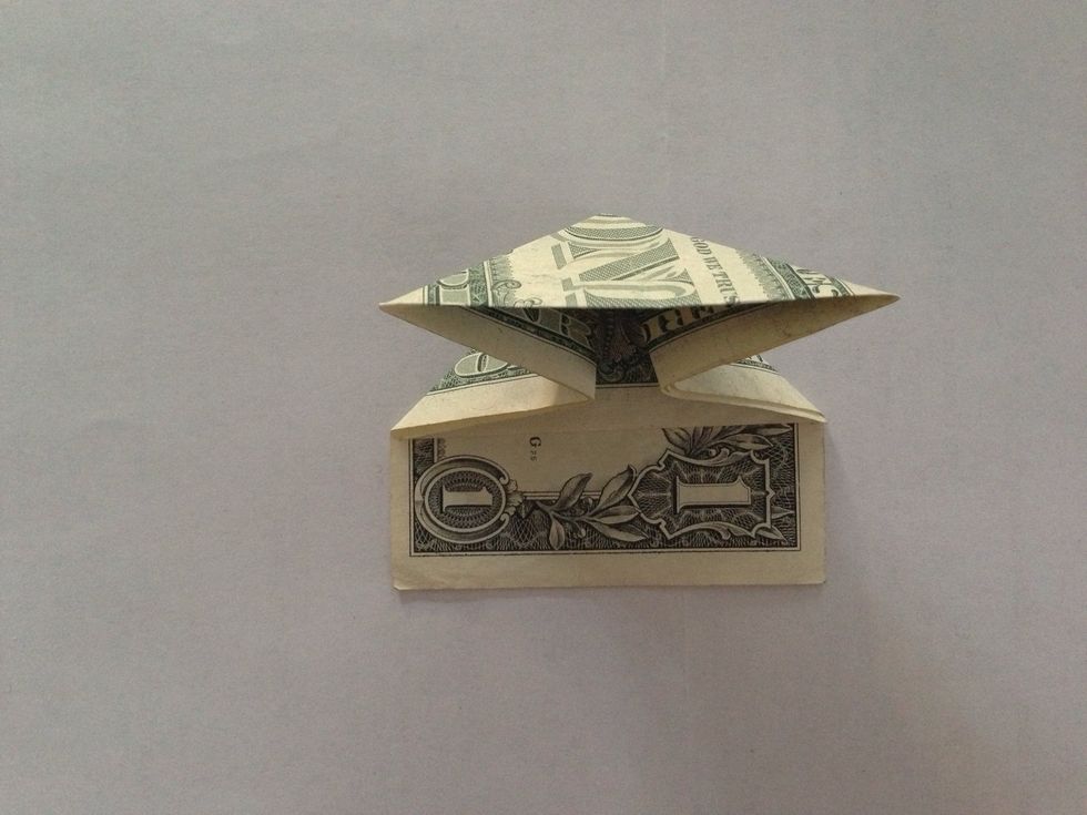 Bend both left & right sides inward like image.