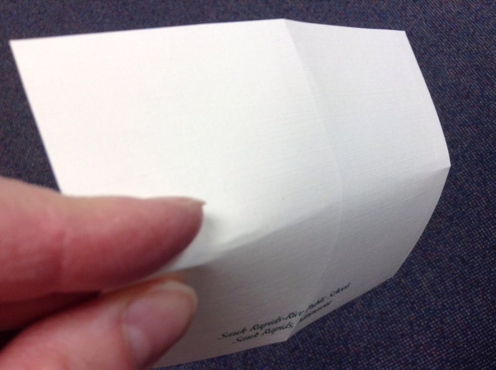 Bend in 1/2, but only squeeze edge to mark midpoint.