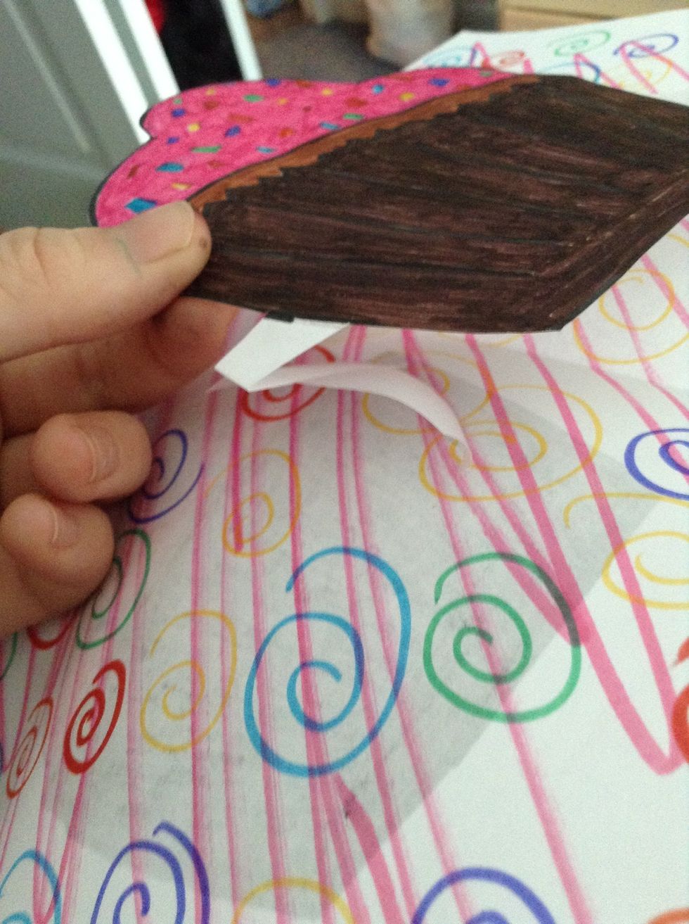 Bend over tabs and tape or glue them down