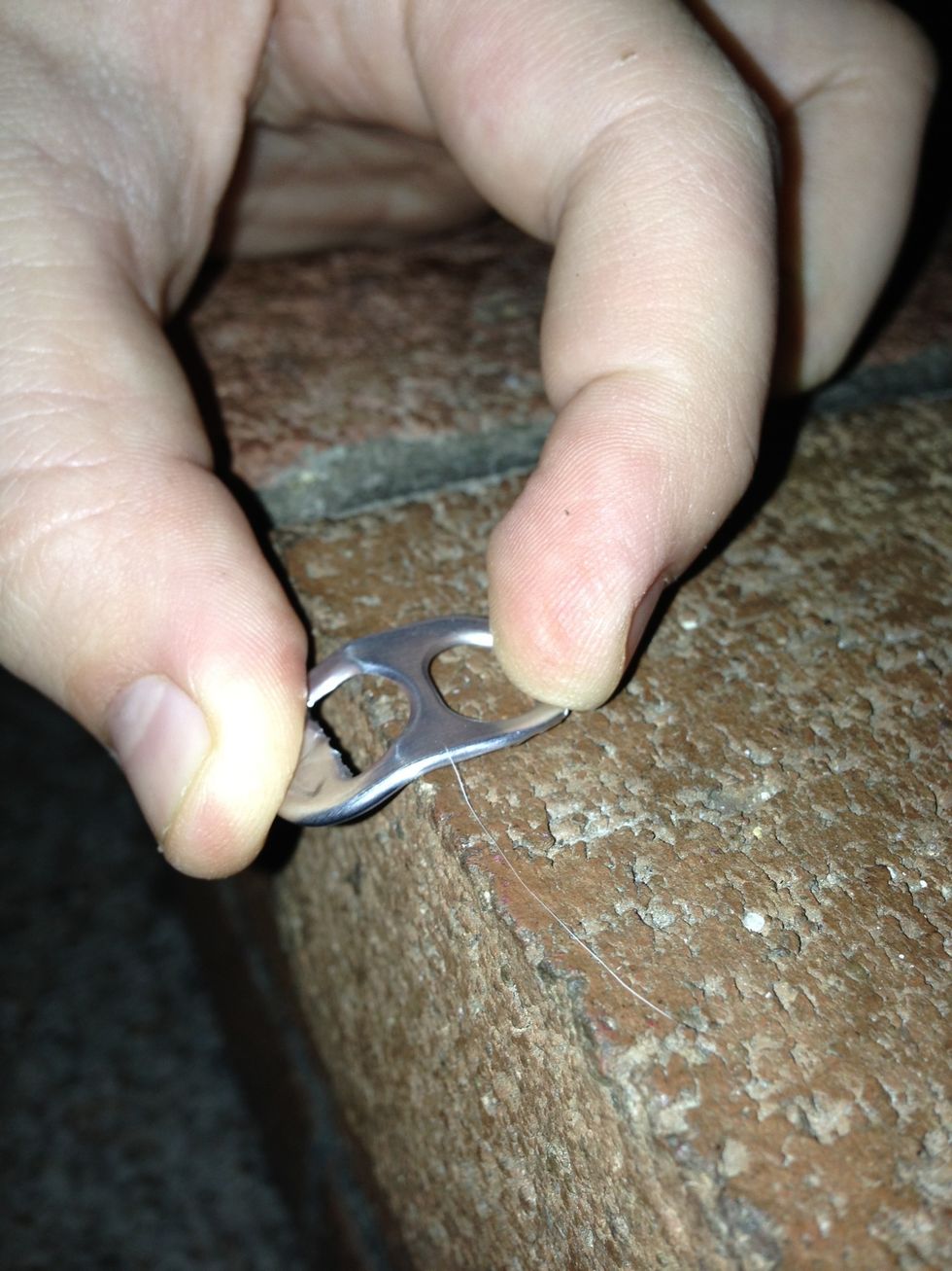 Bend over your surface, I used bricks or you could use needle nose pliers!