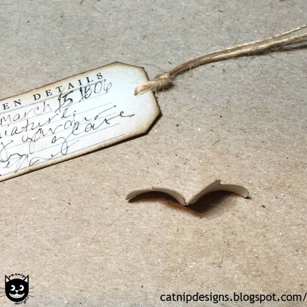 Bend the butterfly's wings as shown...