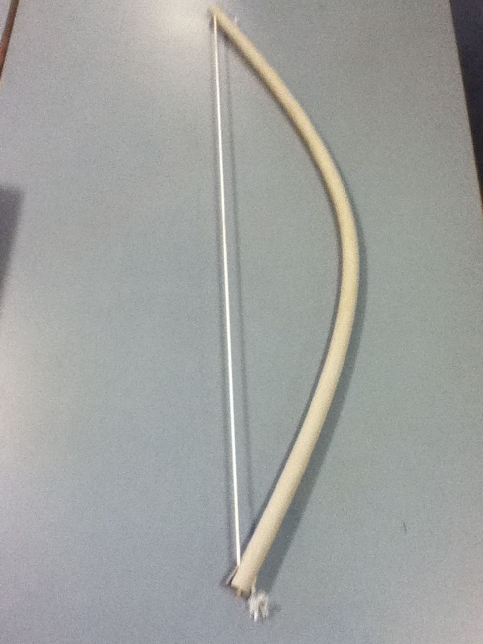 Bend the electricity pipe and make sure that the string will fit in the slots ( don't make the string to loose).