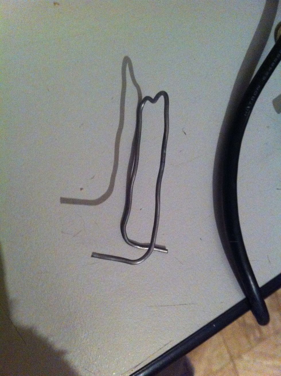 Bend the ends in opposite directions.