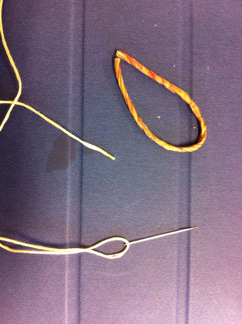 Bend the floral wire into a teardrop shape.