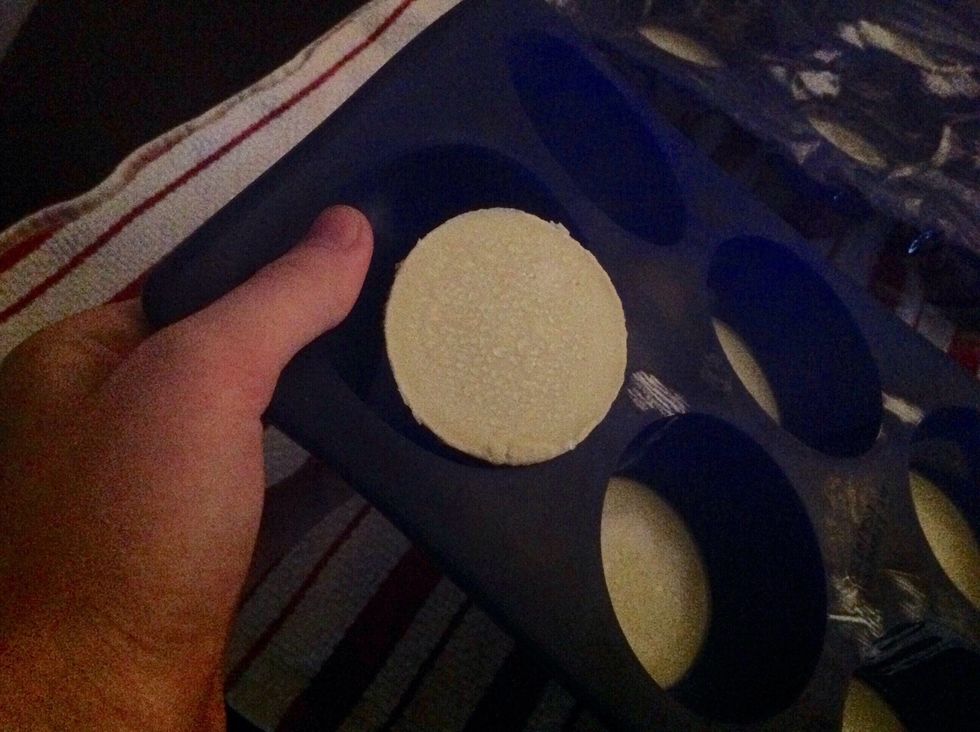 Bend the mold to remove soap.