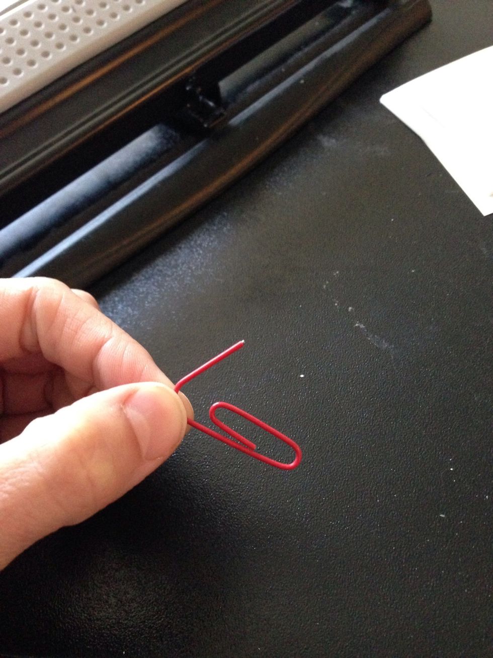 Bend the outer most piece and bend it outwards away from the center but still on the same plane.