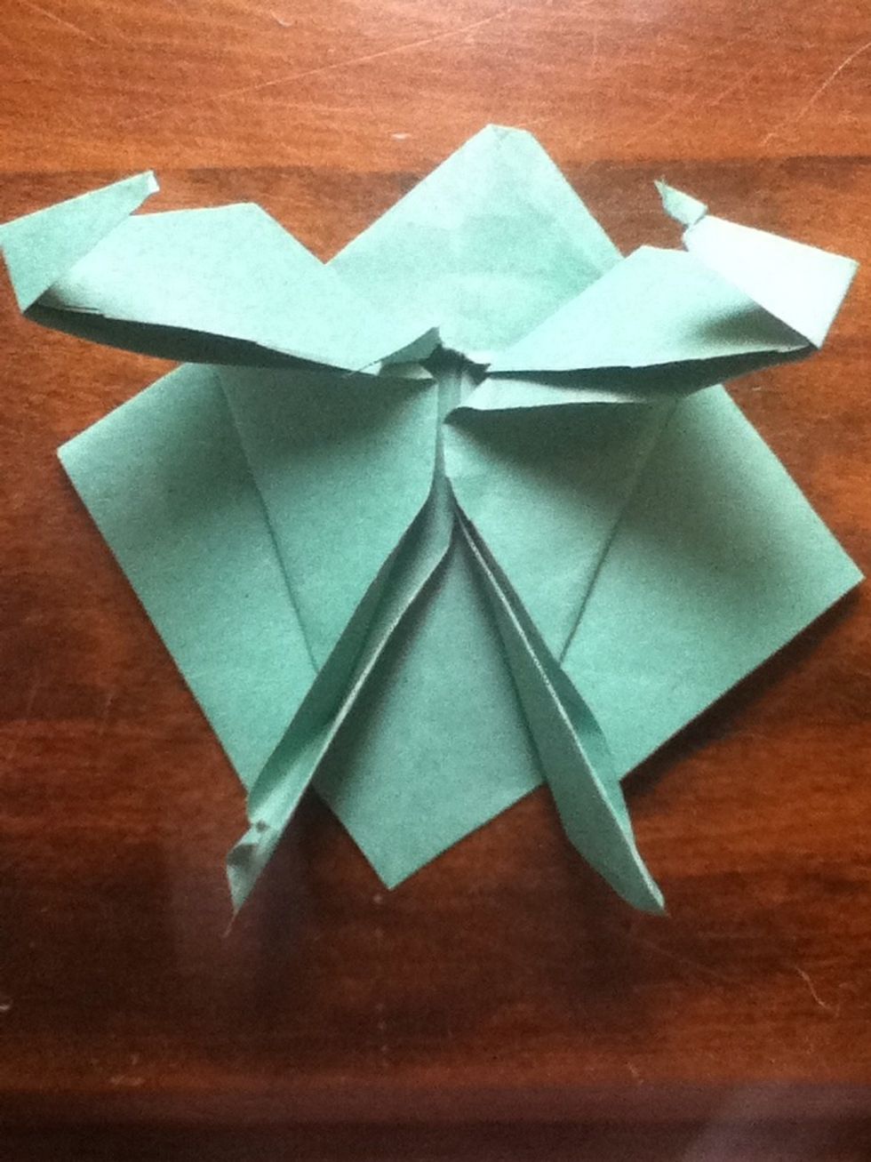 Bend the tip of the flaps inwards.