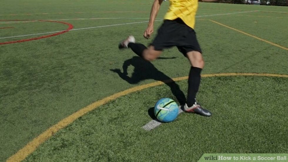 Bend your leg so it is parallel to the ground and lift back