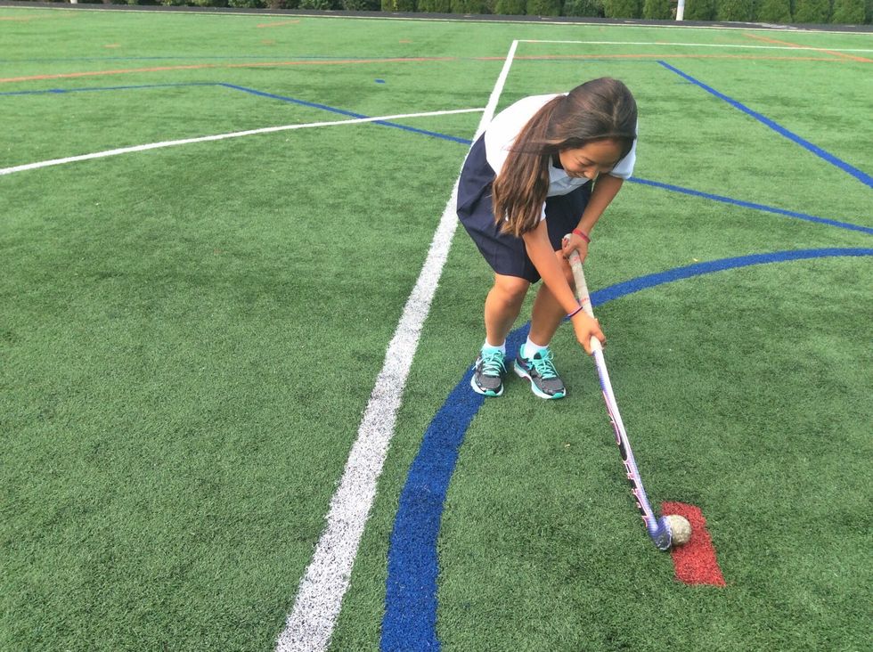 Bend your legs and get down low. All the power of the shot comes from your legs.