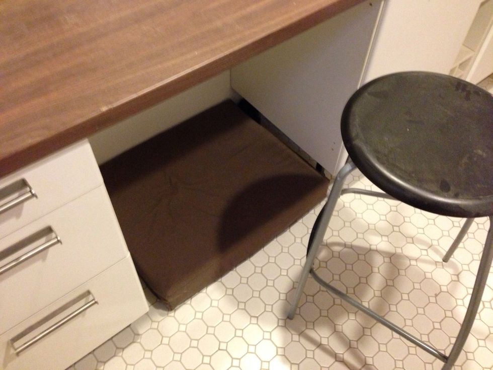 Beneath the countertop is a space to put my feet while sitting down. The matress is there in case one of our dogs decides to visit.
