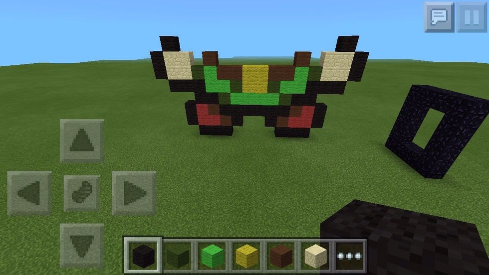 Beside the sandstones on each side, two blacks, and on top, one.